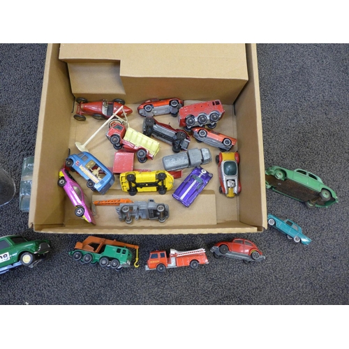 733 - A collection of die-cast model vehicles and motorcycles including early Dinky, some packaged