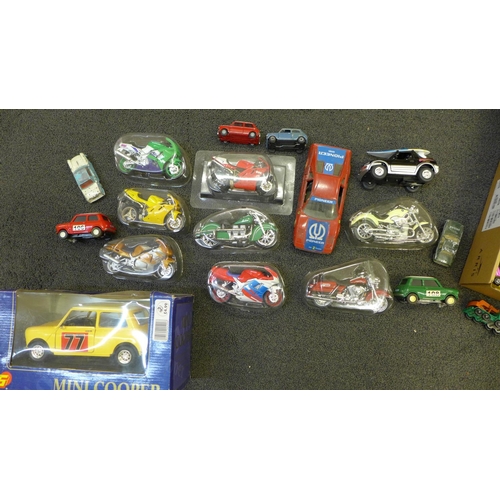 733 - A collection of die-cast model vehicles and motorcycles including early Dinky, some packaged