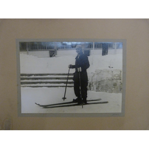 810 - A 1920's ski-suit and accompanying photograph