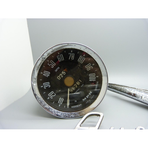 814 - A vintage Smiths car speedometer, Austin, Ford, Audi and other car badges