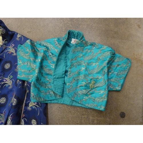 822 - A long viscose Chinese coat and a small bolero