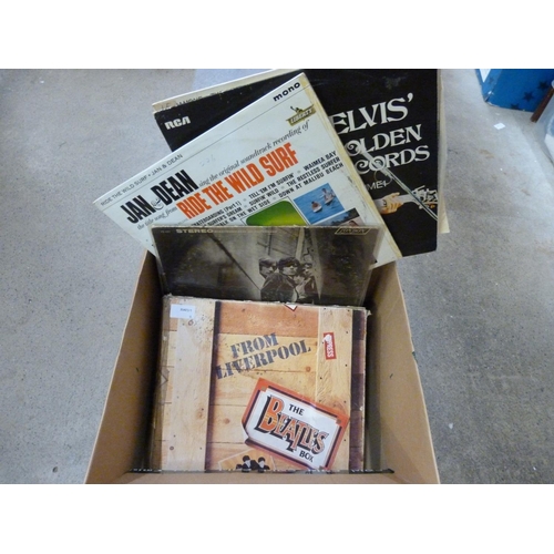 825 - A box set of eight Beatles LPs and 30 LPs from 1960s artists including The Rolling Stones, Elvis Pre... 