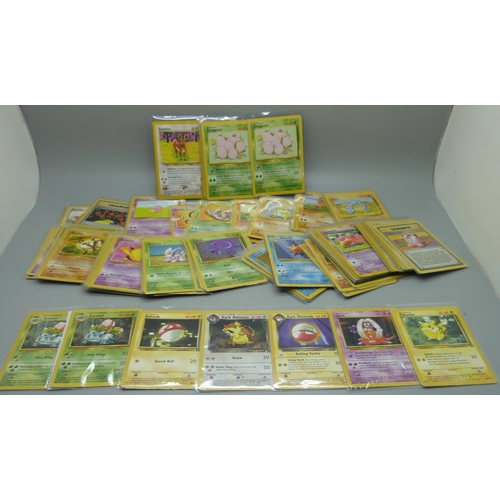 831 - Approximately 100 Pokemon cards, 28 Base set including shiny Machamp, Jungle and Dark Set with first... 