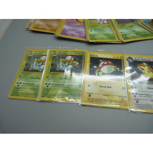 831 - Approximately 100 Pokemon cards, 28 Base set including shiny Machamp, Jungle and Dark Set with first... 