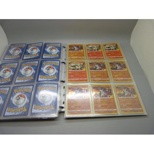 833 - A collection of 333 holographic celebration Pokemon cards