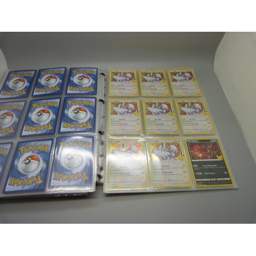 833 - A collection of 333 holographic celebration Pokemon cards