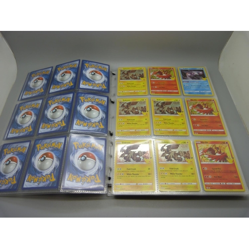 833 - A collection of 333 holographic celebration Pokemon cards