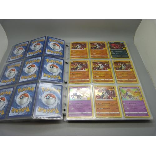 833 - A collection of 333 holographic celebration Pokemon cards