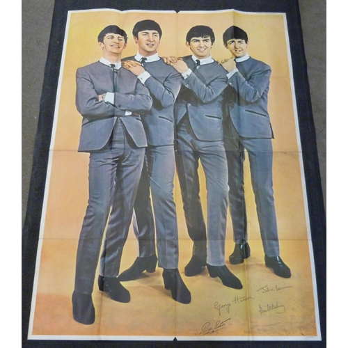 834 - A large The Beatles poster, (early 1960's)