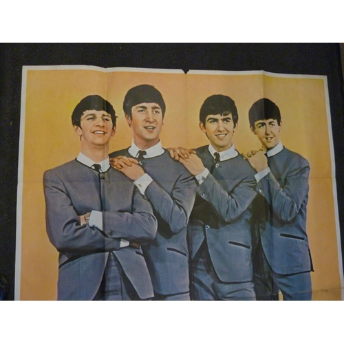 834 - A large The Beatles poster, (early 1960's)