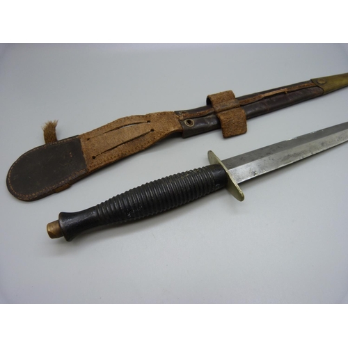 835 - A Commando knife with scabbard