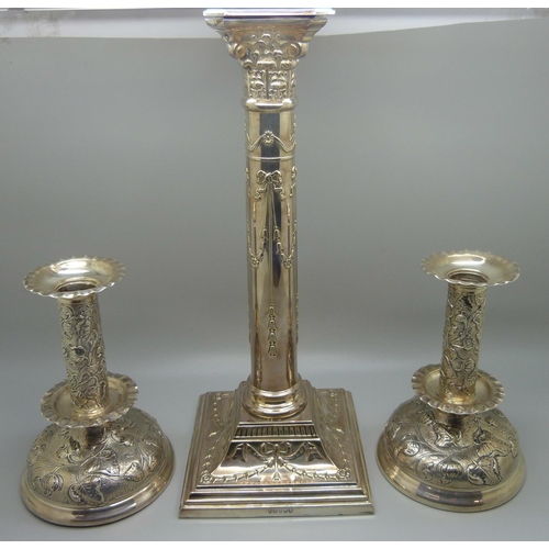 838 - A pair of hallmarked silver candlesticks, London 1901, 14.5cm, and a single plated candlestick