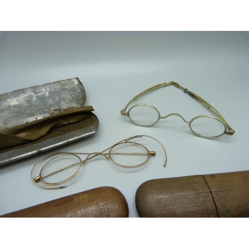 846 - Three pairs of spectacles including one Georgian silver pair