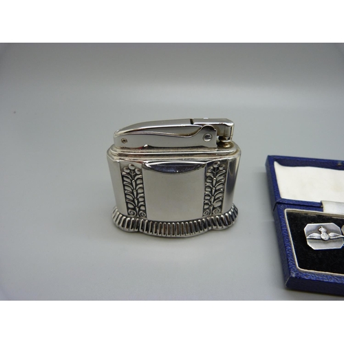 857 - A pair of hallmarked silver RAF cufflinks and a Ronson table lighter