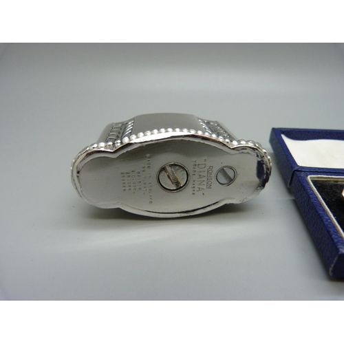 857 - A pair of hallmarked silver RAF cufflinks and a Ronson table lighter