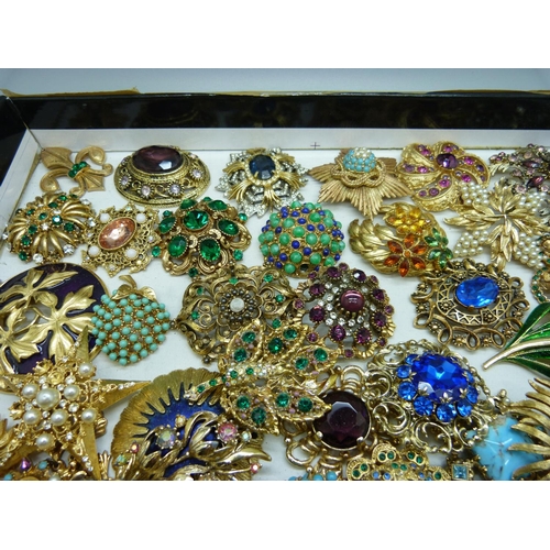 871 - A collection of brooches lacking pins, (for repair or repurposing)