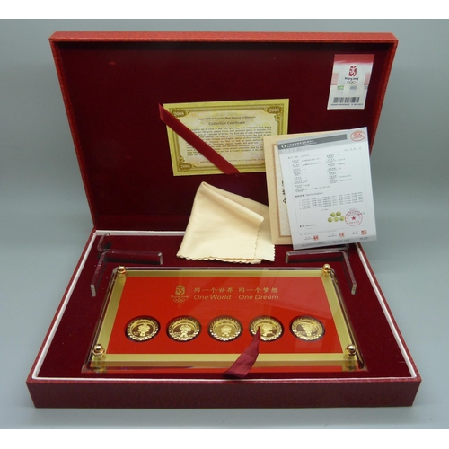 892 - A Beijing Olympics commemorative gold plated coin set