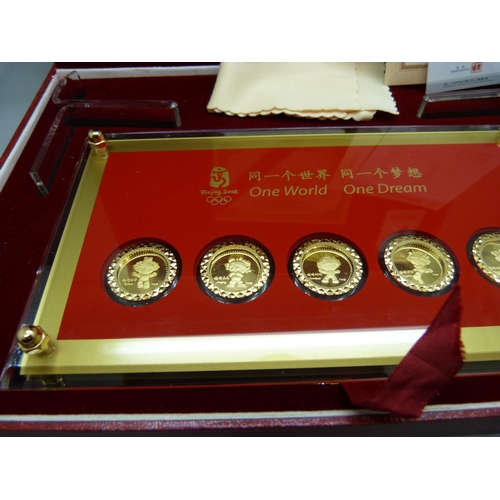 892 - A Beijing Olympics commemorative gold plated coin set