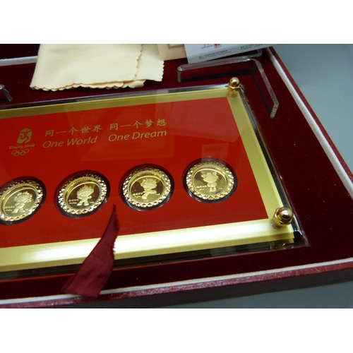 892 - A Beijing Olympics commemorative gold plated coin set