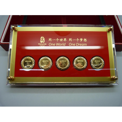 892 - A Beijing Olympics commemorative gold plated coin set