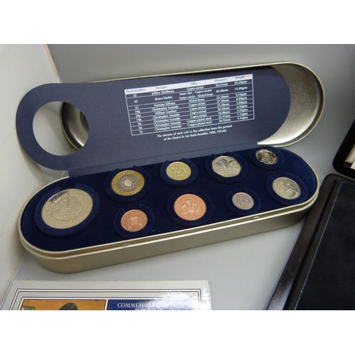 893 - A collection of coins including a Millennium set and a Coronation Anniversary crown set