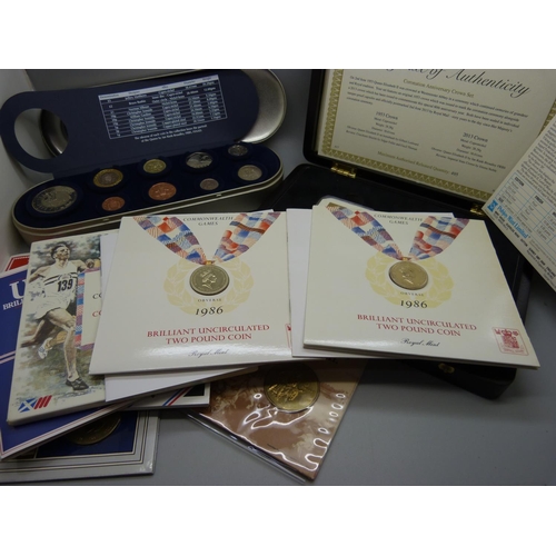 893 - A collection of coins including a Millennium set and a Coronation Anniversary crown set