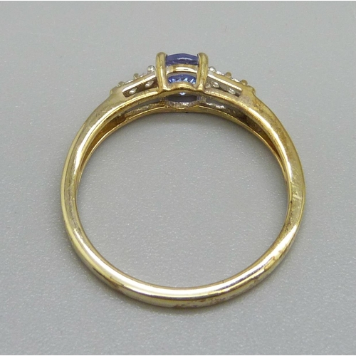 914 - A silver gilt, tanzanite and zircon ring, S, with certificate