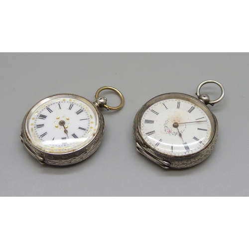 920 - Two 935 silver fob watches, one hand loose