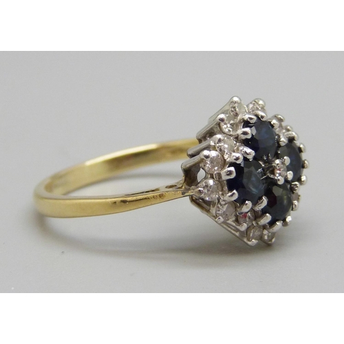 922 - An 18ct gold, sapphire and diamond cluster ring, 4g, Q