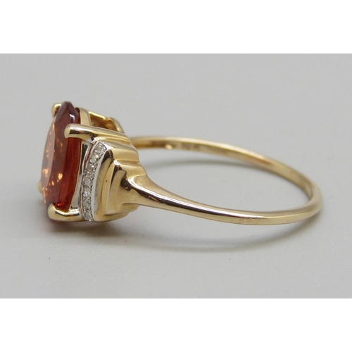 930 - A 9ct gold, Oregon sunstone and diamond ring, 2.1g, O