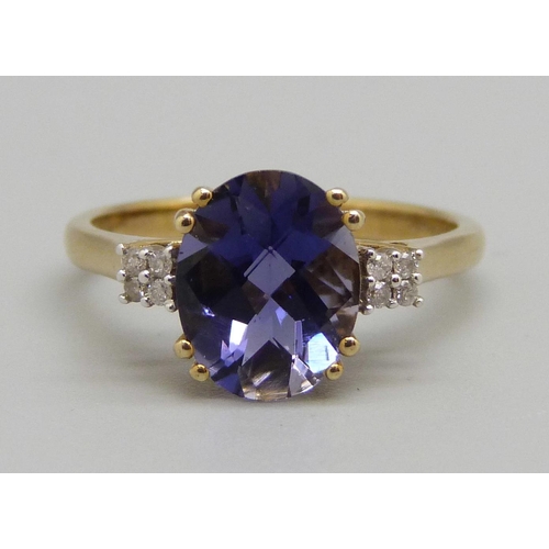 935 - A 9ct gold, iolite and diamond ring, 2.4g, N