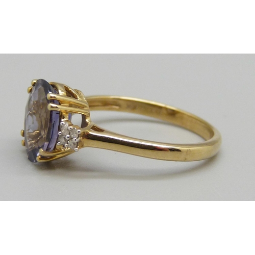 935 - A 9ct gold, iolite and diamond ring, 2.4g, N