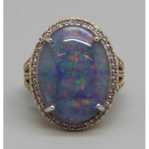 936 - A silver gilt mosaic opal and white stone ring, P, stone approximately 14mm x 19mm