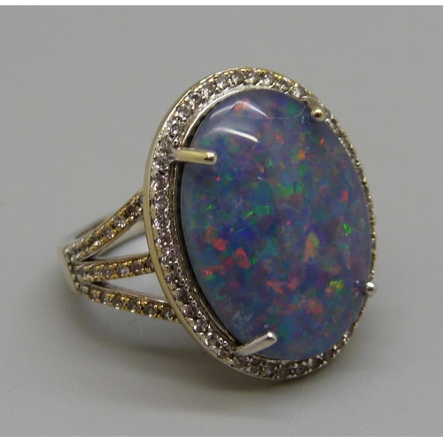 936 - A silver gilt mosaic opal and white stone ring, P, stone approximately 14mm x 19mm