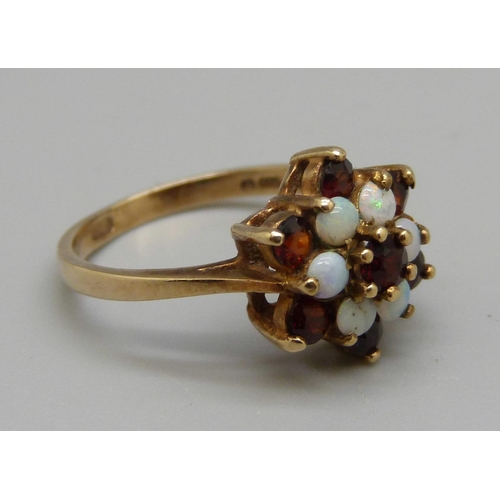 937 - A 9ct gold, opal and garnet cluster ring, 2.7g, M