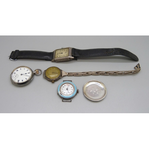 940 - A silver cased wristwatch lacking minute hand, 24mm case, two other silver wristwatches and an Omega... 