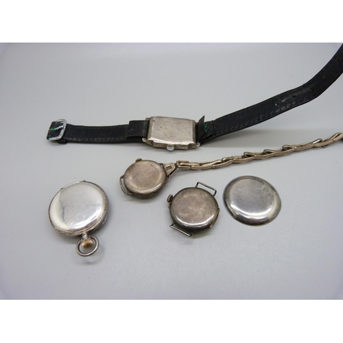 940 - A silver cased wristwatch lacking minute hand, 24mm case, two other silver wristwatches and an Omega... 