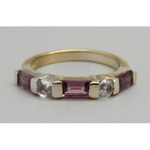 945 - A silver gilt and pink tourmaline ring, L