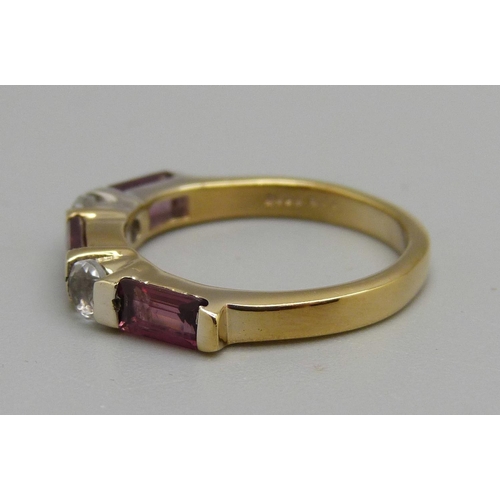 945 - A silver gilt and pink tourmaline ring, L