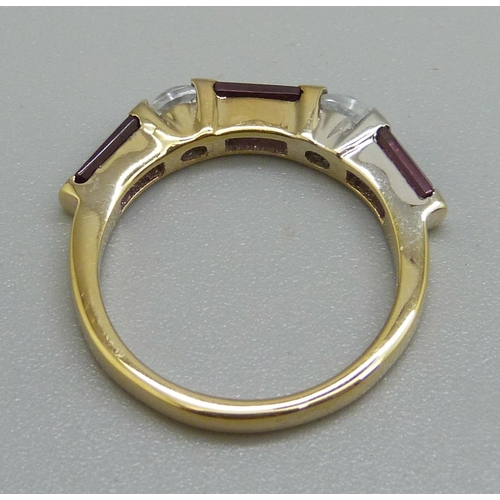 945 - A silver gilt and pink tourmaline ring, L