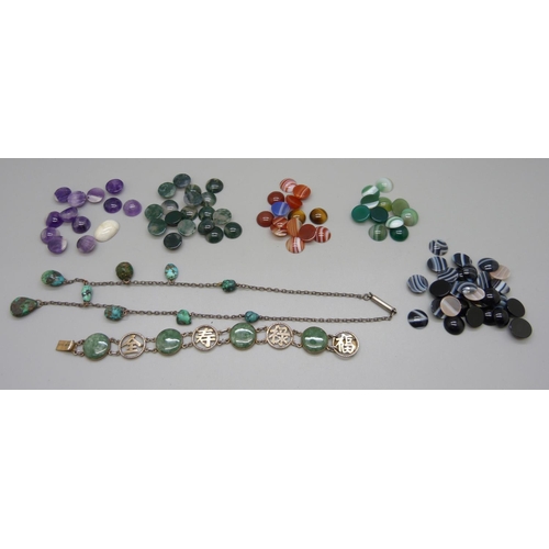 948 - A collection of unmounted agate stones, a jadeite bracelet and a turquoise necklace