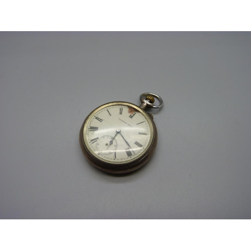 960 - A Tavanne's pocket watch with broad arrow to the case back, dial a/f and an agate set watch key