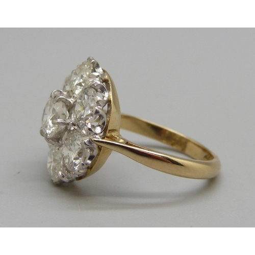 964 - An 18ct gold and platinum diamond cluster ring, 3.8 carat diamond weight, 5.3g, N