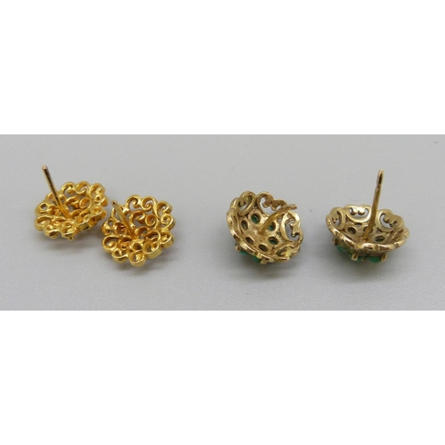 975 - A pair of 9ct gold earrings, 2.4g, silver gilt and turquoise earrings and a yellow metal and coral s... 