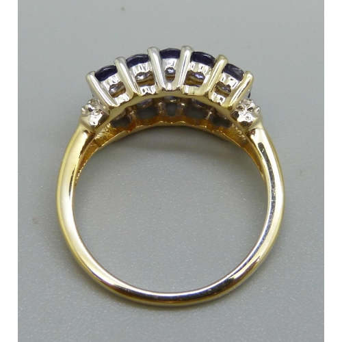 982 - A silver gilt Bengal iolite and white topaz ring, with certificate, P