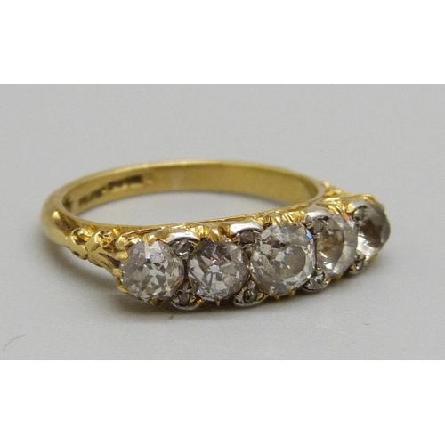 986 - An 18ct gold and platinum five stone diamond ring, 3.6g, M