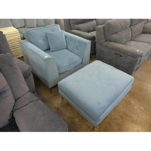 1323 - A sky blue velvet oversized armchair with footstool