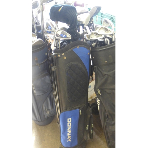 2145 - 4 Golf bags with approx. 80 clubs