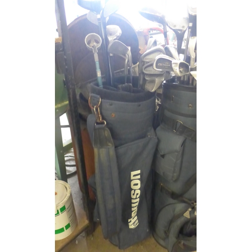 2147 - 2 Golf bags with clubs