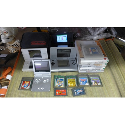 2217 - Nintendo Game Boy (yellow) with games, Game Boy Advance SP and 2 Nintendo DSs